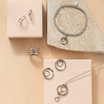 Ripples Silver Half-Hoop Earrings with Topaz