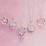 Ripples Silver Double-Hoop Pendant with Topaz