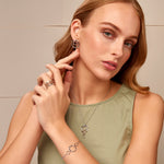 Ripples Silver Four-Hoop Pendant with Topaz