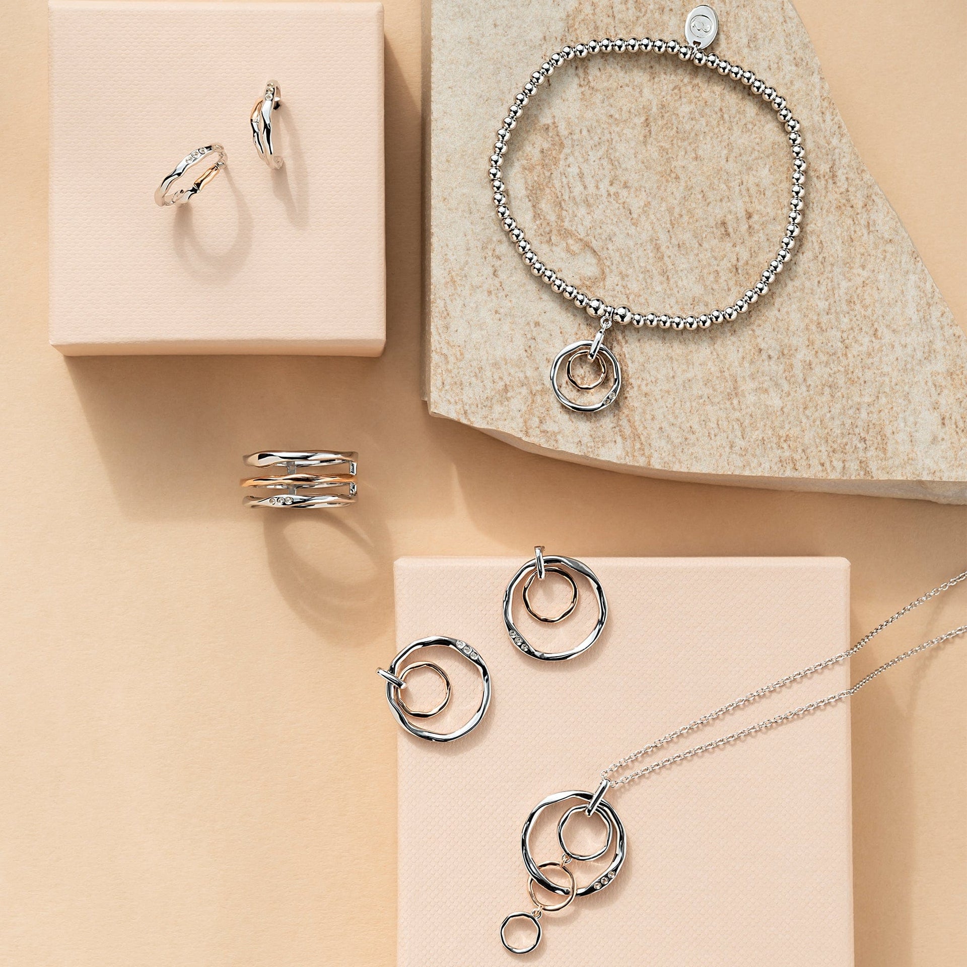 Ripples Silver Four-Hoop Pendant with Topaz