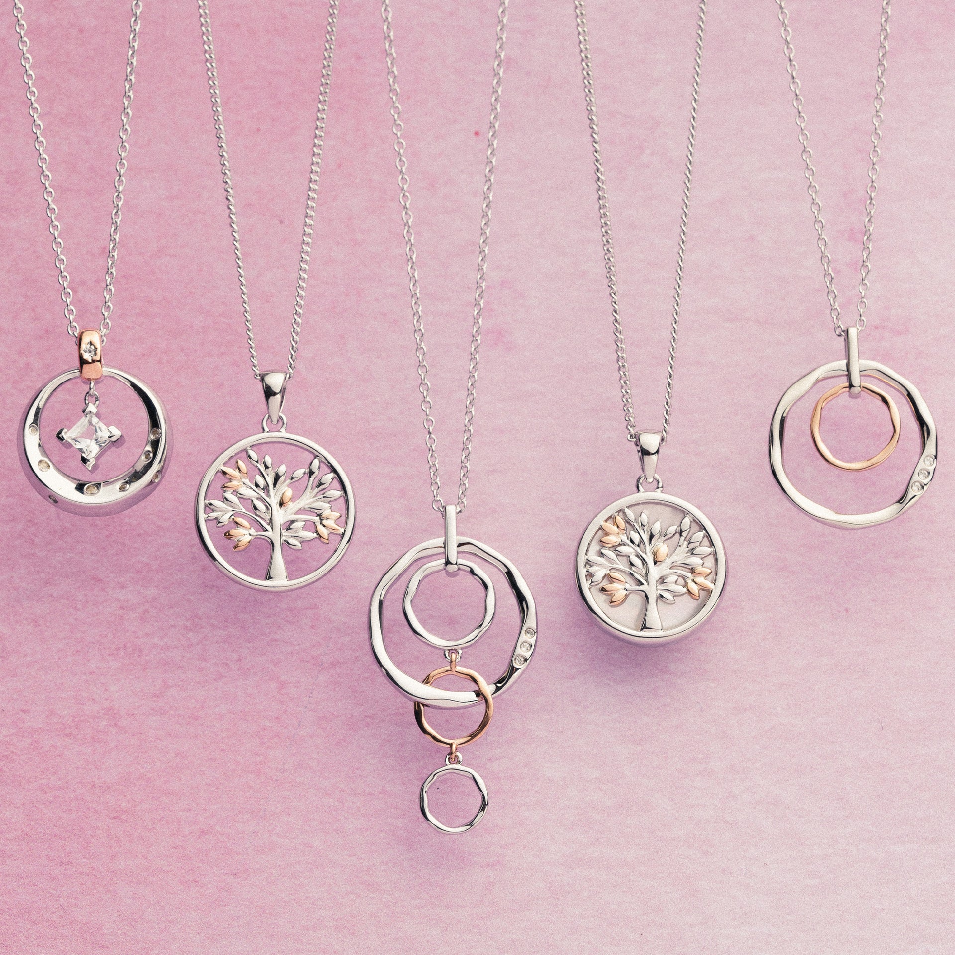 Ripples Silver Four-Hoop Pendant with Topaz