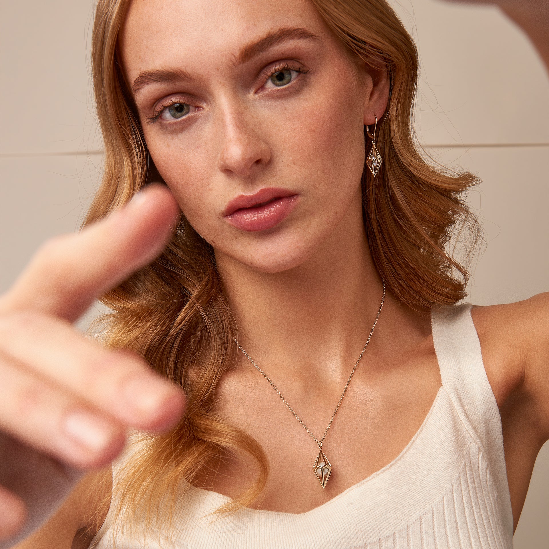 Watching Chamber Gold and Caged Pearl Pendant