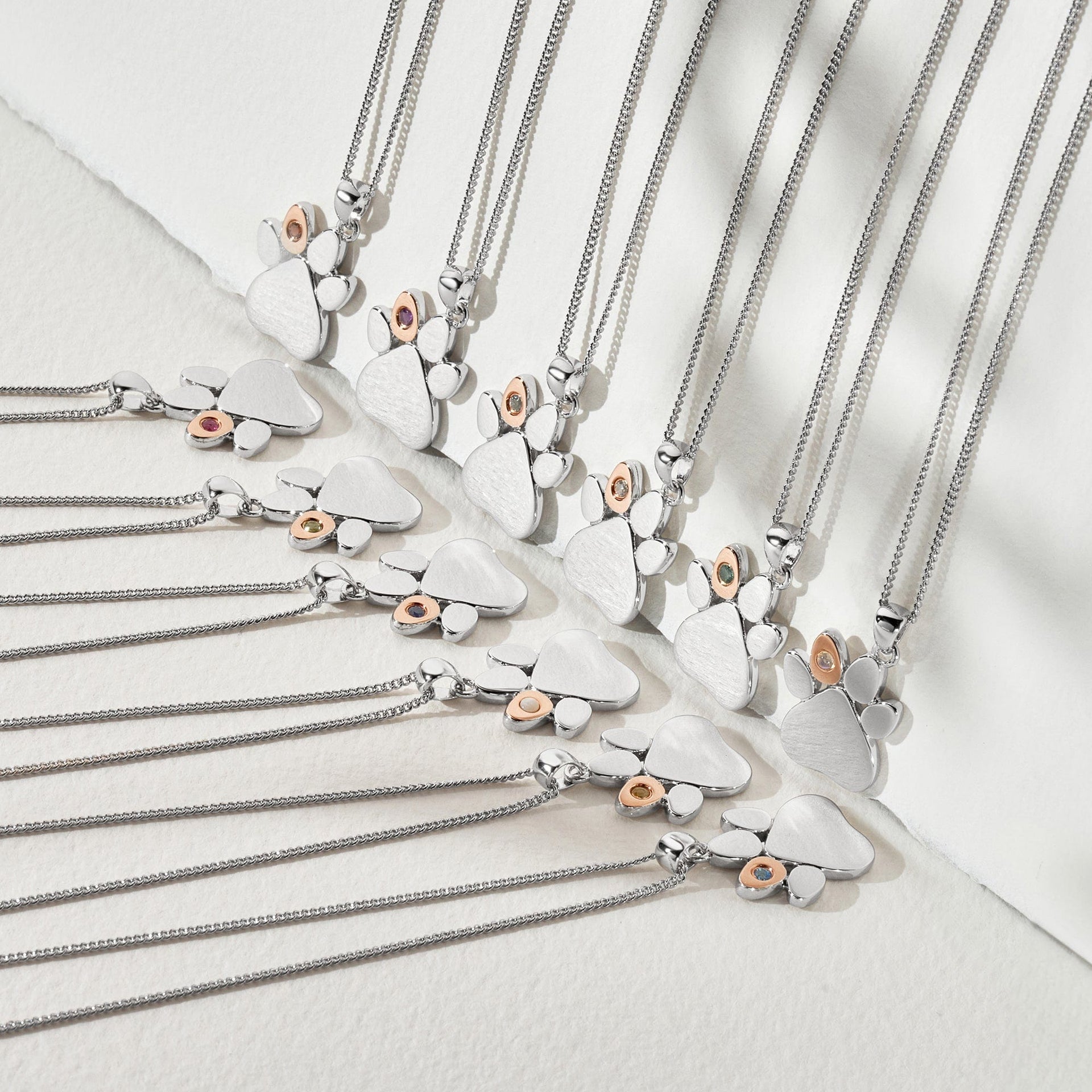 Paw Prints Sterling Silver Birthstone Pendant for May with Emerald