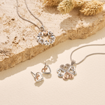 Hearts Embrace Silver and Swarovski Topaz Pendant