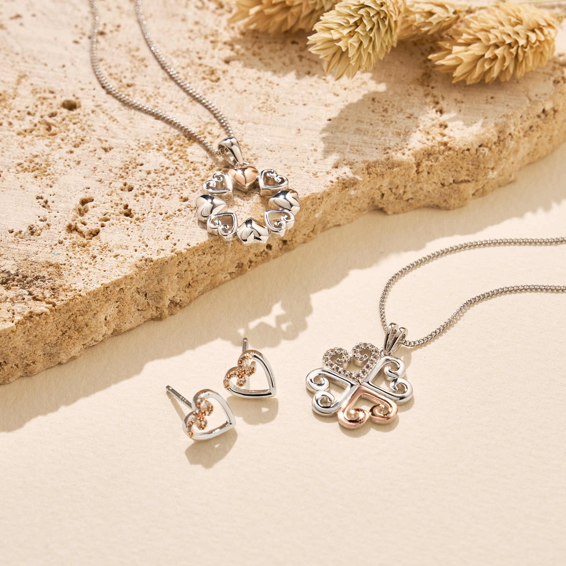 Hearts Embrace Silver Circular Pendant